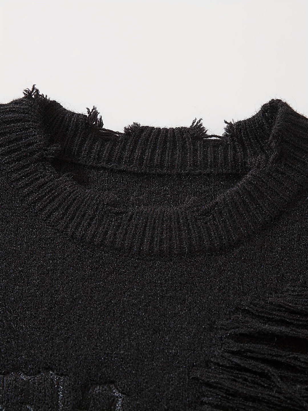 Gemusterter zerrissener Strickpullover